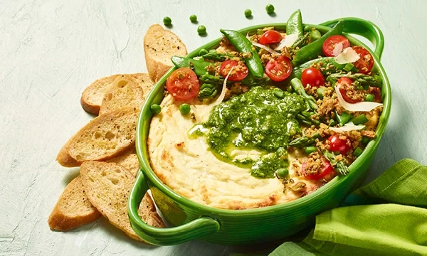 Baked Ricotta Bowl with Spring Vegetables and Pistachio-Herb Crumble