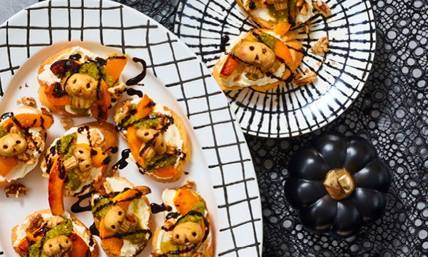 Pumpkin, Pesto & Goat Cheese Crostini with Mushroom Skulls